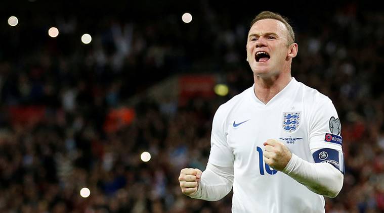 Wayne Rooney celebrates after scoring the second goal for England from the penalty spot and becoming England's all time leading goalscorer
