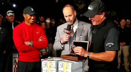 Nov 23, 2018; Las Vegas, NV, USA; Phil Mickelson reacts with the winner's belt after beating winning The Match: Tiger vs Phil golf match at Shadow Creek Golf Course. Mandatory Credit: Rob Schumacher-USA TODAY Sports
