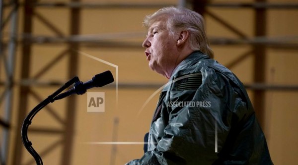 Trump finally hews to ritual of meeting troops in harm's way