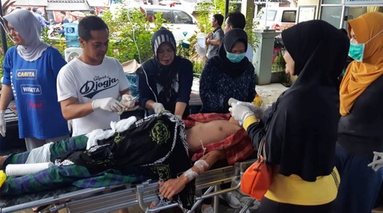 Indonesia hunts for survivors as tsunami death toll crosses 400 ...