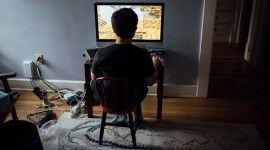 A boy plays Minecraft while waiting for dinner at his home in Cleveland Heights, Ohio. screen time and kids