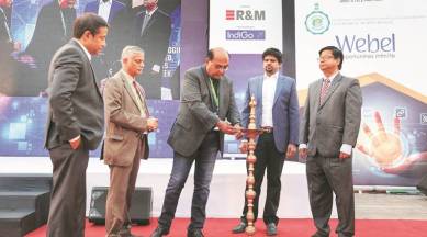 FILE -- Joy Buolamwini, a researcher at the MIT Media Lab, at her office in Cambridge, Mass., Feb. 1, 2018. Buolamwini is the founder of the Algorithmic Justice League, an organization trying to fight what it calls the “coded gaze” of biased algorithms. (Tony Luong/The New York Times)
