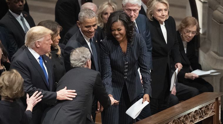 George H.W. Bush, George H.W. Bush funeral, george w bush, michelle obama, bush give michelle obama candies, viral videos, indian express