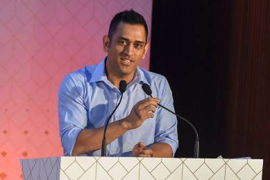 Indian cricketer MS Dhoni addresses the book launch event of a coffee table book on the journey of India Cements Ltd., in Chennai
