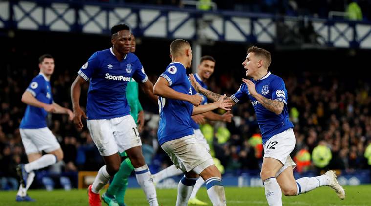 Everton's Lucas Digne celebrates scoring their second goal against Watford with team mates