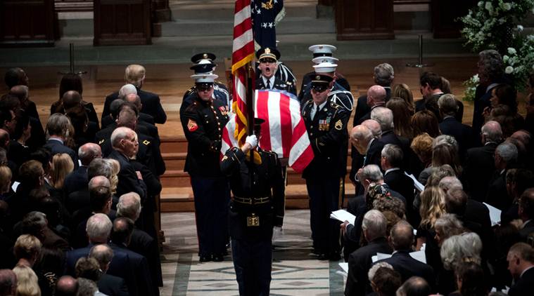 US bids goodbye to George HW Bush with high praise, cannons, humor