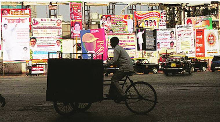 illegal banners, bmc removes illegal banners, illegal political banners, illegal political hoardings, indian express