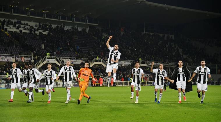Juventus players celebrate after the match against Fiorentina