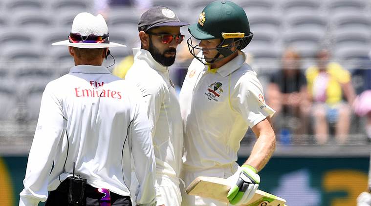 India vs Australia: Virat Kohli, Tim Paine clash, pulled up by umpire | Sports News,The Indian Express