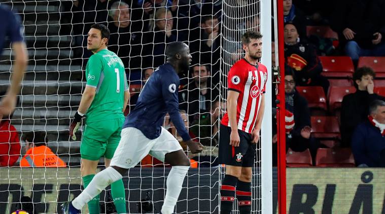 Manchester United's Romelu Lukaku celebrates their second goal as Southampton's Jack Stephens and Alex McCarthy look dejected