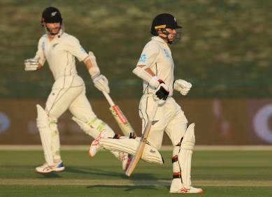 New Zealand's batsman Tom Latham, right, and Kane Williamson run in their test match against Pakistan in Abu Dhabi, United Arab Emirates