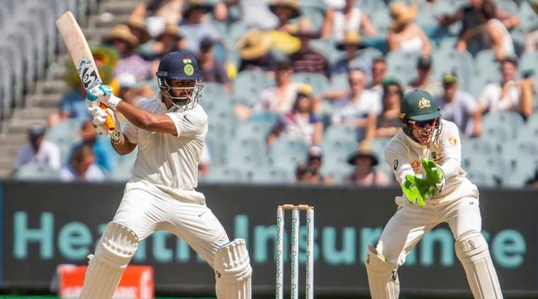 India's Rishabh Pant plays a cut shot during a play on day two of the third cricket test between India and Australia in Melbourne, Australia