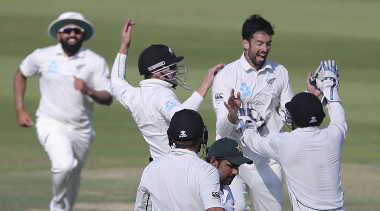 New Zealand's players celebrate dismissal of Pakistan's Sarfraz Ahmed in their test match in Abu Dhabi