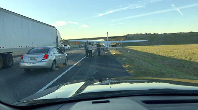 plane emergency landing, plance lands on state highway, plane emergency landing alabama, pilot lands to relieve himself, viral news, odd news, indian express