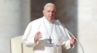 FILE PHOTO: Pope Francis leads the weekly general audience in Saint Peter’s square at the Vatican Don't blame migrants for everything, Pope tells politicians