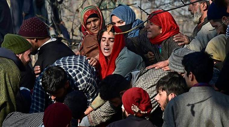 Villagers wail while attending the funeral of civilians and militants who were killed in the encounter today. (Photo credit: PTI)