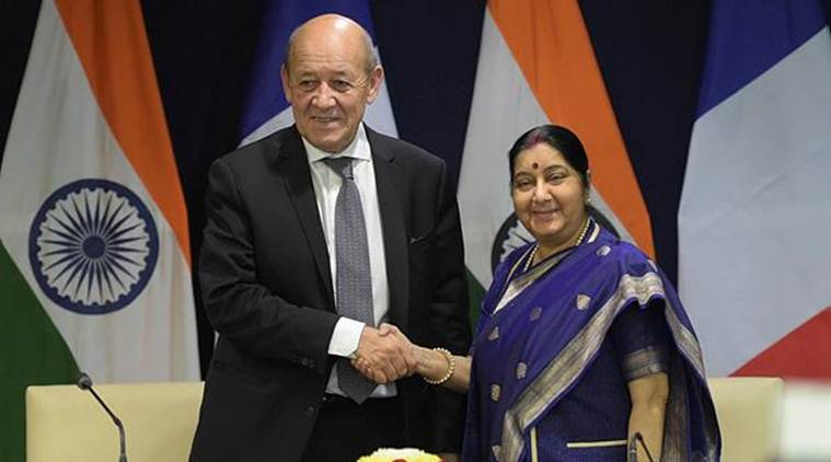External Affairs Minister Sushma Swaraj and Minister of Europe and Foreign Affairs of France Jean-Yves Le Drian exchange greetings after their joint press statement in New Delhi on Saturday. (Photo credit: PTI)