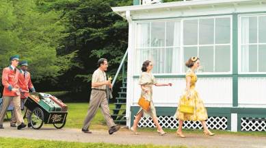 Tony Shalhoub, Marin Hinkle, and Rachel Brosnahan in a scene