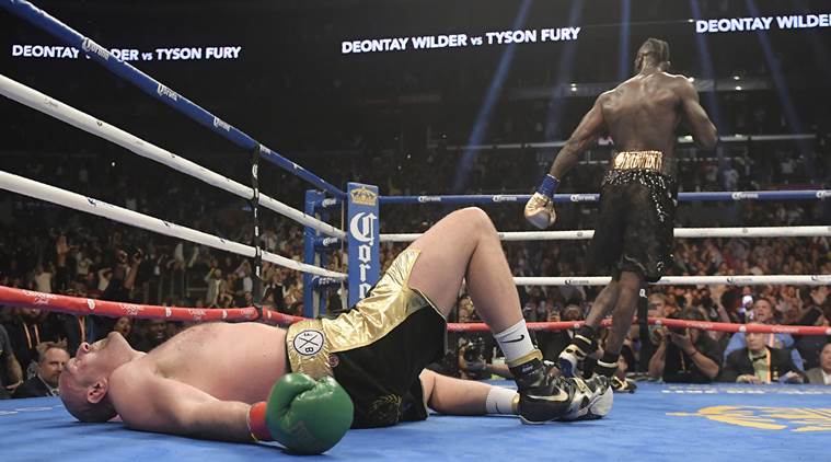 watch-tyson-fury-gets-up-after-getting-knocked-down-in-12th-round