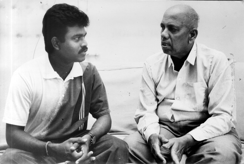 Cricket player Praveen Amre with his coach Ramakant Achrekar.