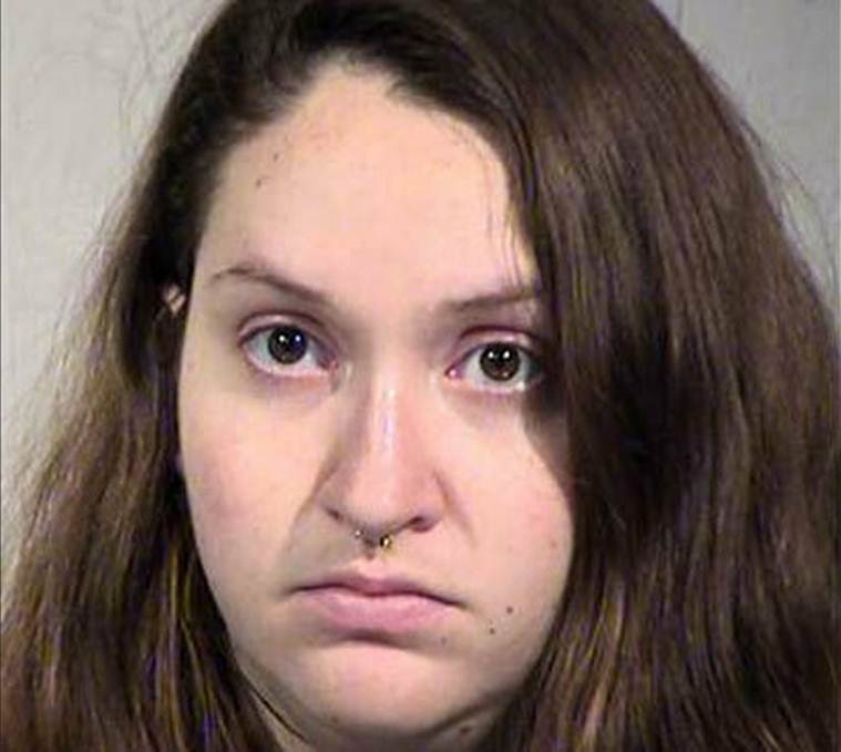 Mother arrested after dead baby found in Amazon site's restroom