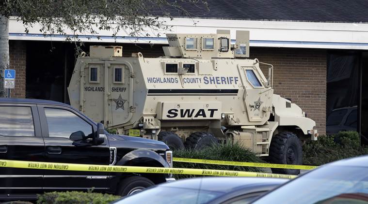 ‘I have shot five people’: 21-year-old held in massacre at Florida Bank