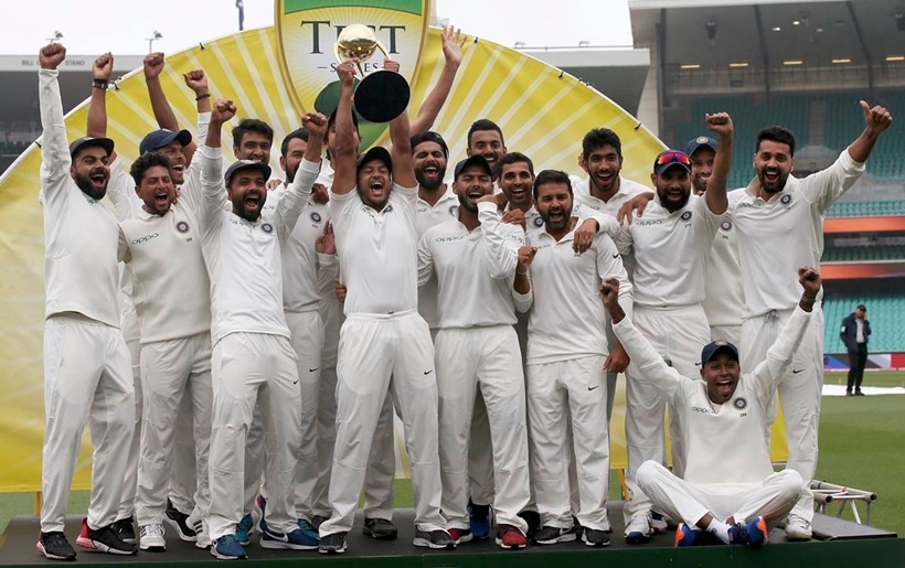 The Indian cricket team celebrate their series win over Australia after play was called off on day 5 of their cricket test match in Sydney,