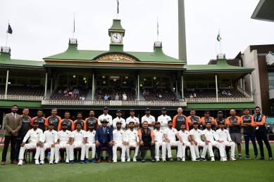The Indian cricket team and staff pose for a photograph ahead of play on day five of the fourth test match between Australia and India at the SCG in Sydney, Australia