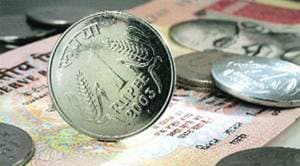Rupee firms up by 10 paise to 69.34 against US dollar
