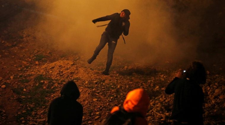 US agents fire tear gas at 'violent mob' near Mexico border