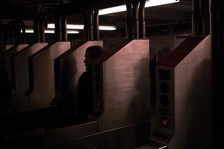 A commuter at the Bedford Avenue L stop in Brooklyn