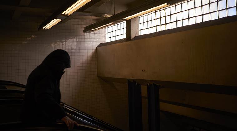 A commuter in the No. 7 train station on Roosevelt Avenue in Queens.