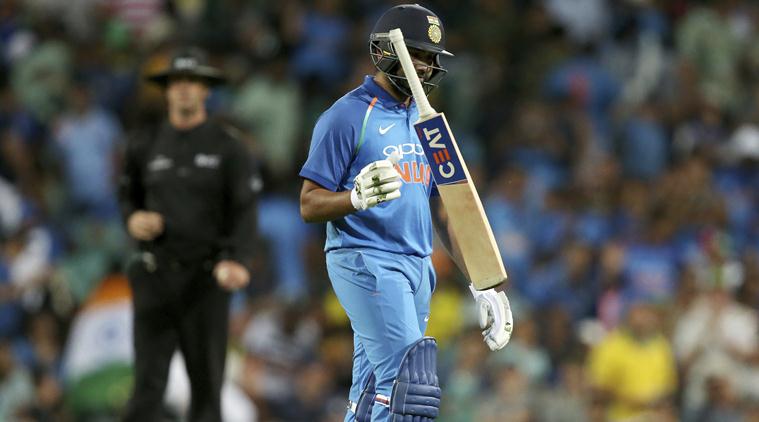 Rohit Sharma walks back to the pavilion