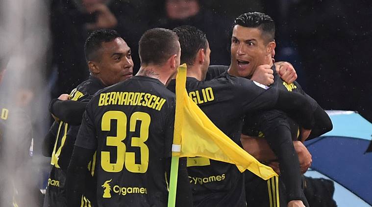 Juventus' Cristiano Ronaldo celebrates scoring their second goal against Lazio with team mates