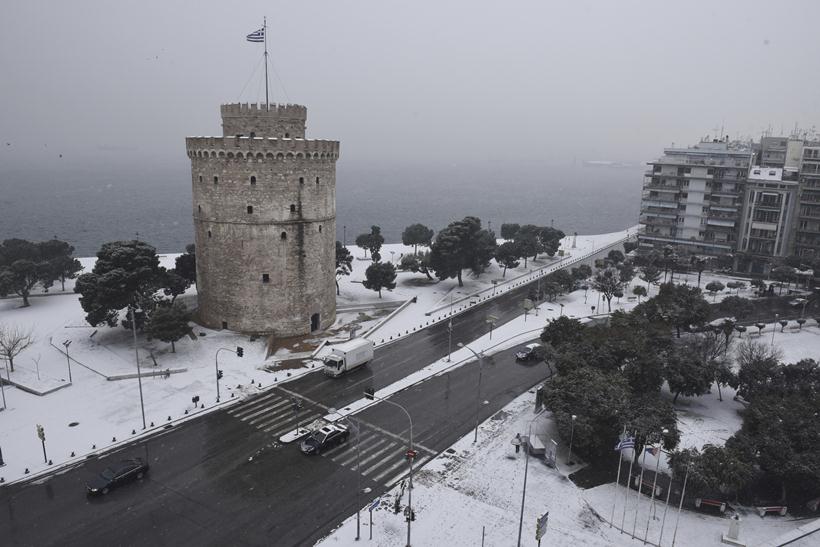 Snow coats ancient monuments in Athens amid record cold spell