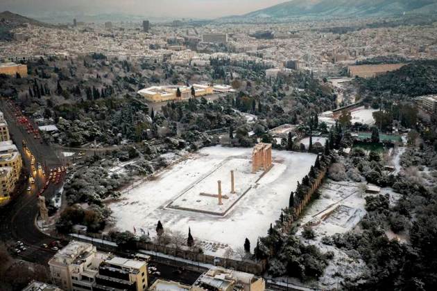 Snow coats ancient monuments in Athens amid record cold spell