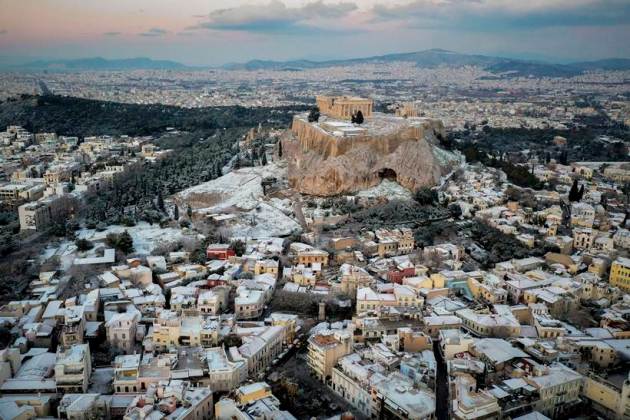 Snow coats ancient monuments in Athens amid record cold spell