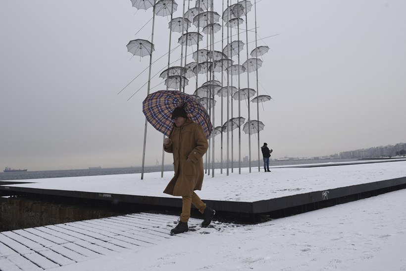 Snow coats ancient monuments in Athens amid record cold spell
