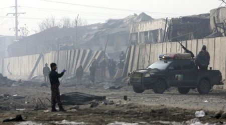 Taliban attack on Afghan security base kills over 100