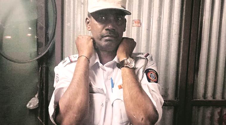 Traffic cop dragged for 2 km as he clutches to window of mini-truck