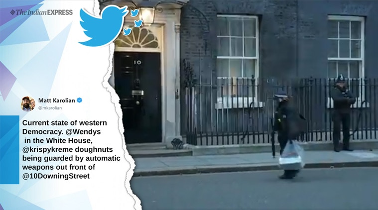 doughnut box downing street, Krispy Kreme doughnuts, doughnuts delivery armed police, UK PM House doughnut video, brexit deal, uk politics, viral news, funny news, indian express