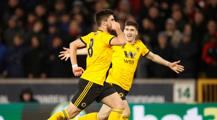 Wolverhampton Wanderers' Ruben Neves celebrates scoring their second goal against Liverpool in the FA Cup