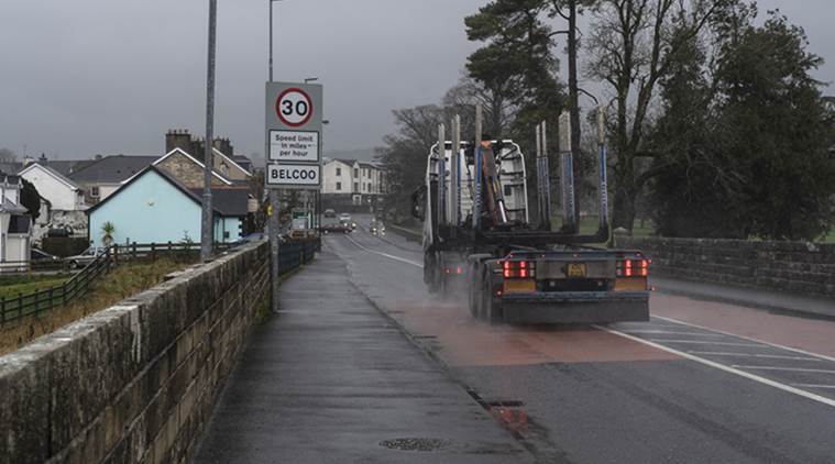 A truck crosses a bridge from Blacklion, Ireland, into Belcoo, a village in Northern Ireland.