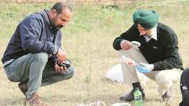 A forensic expert examines the spot where the incident took place, in Ludhiana on Monday. (Express photo/Gurmeet Singh)
