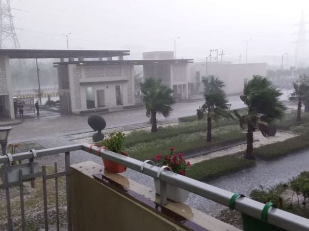 noida hailstorm images, hailstorm in noida pics, hailstorm in noida photos, hailstorm in noida images, noida rain, delhi hailstorm, delhi weather, noida weather, IMD,