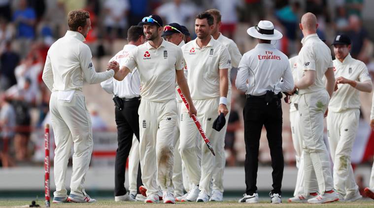England's Mark Wood celebrates with team mates after the match against West Indies