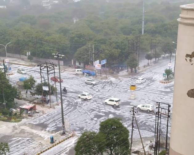 noida hailstorm images, hailstorm in noida pics, hailstorm in noida photos, hailstorm in noida images, noida rain, delhi hailstorm, delhi weather, noida weather, IMD,