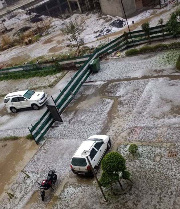 noida hailstorm images, hailstorm in noida pics, hailstorm in noida photos, hailstorm in noida images, noida rain, delhi hailstorm, delhi weather, noida weather, IMD,