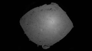 A Japanese spacecraft lands on the surface of an asteroid. Then it fired a bullet