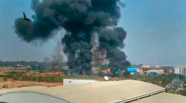 A still from a video grab shows smoke rising from the wreckage of the Mirage-2000 fighter aircraft after it crash landed in Bengaluru. (PTI)